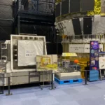 H-II Transfer Vehicle (HTV) ‘Kounotori’ cargo spacecraft exhibit with exposed pallet mock-up and information panels inside the Space Dome at JAXA Tsukuba Space Center.