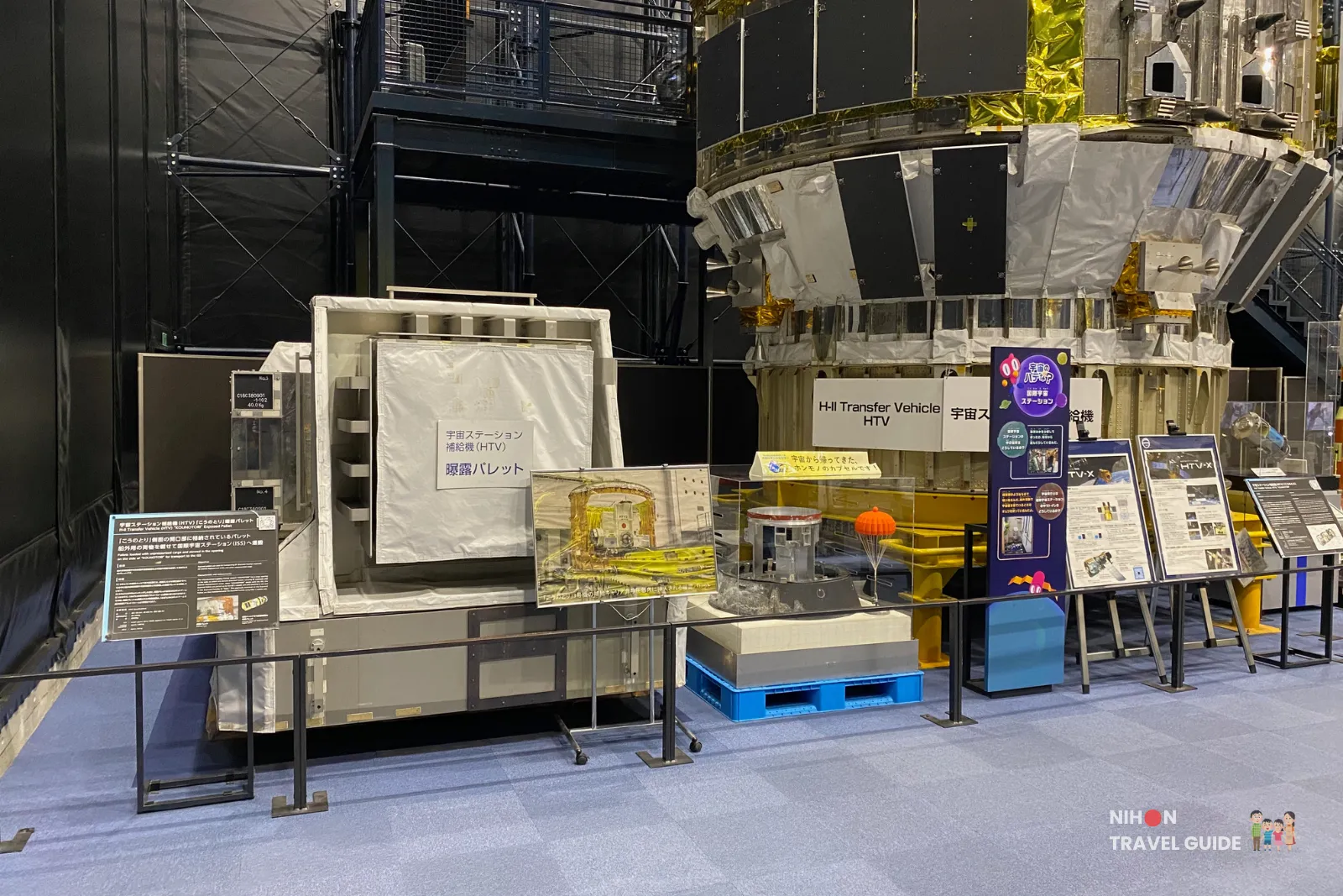 H-II Transfer Vehicle (HTV) ‘Kounotori’ cargo spacecraft exhibit with exposed pallet mock-up and information panels inside the Space Dome at JAXA Tsukuba Space Center.