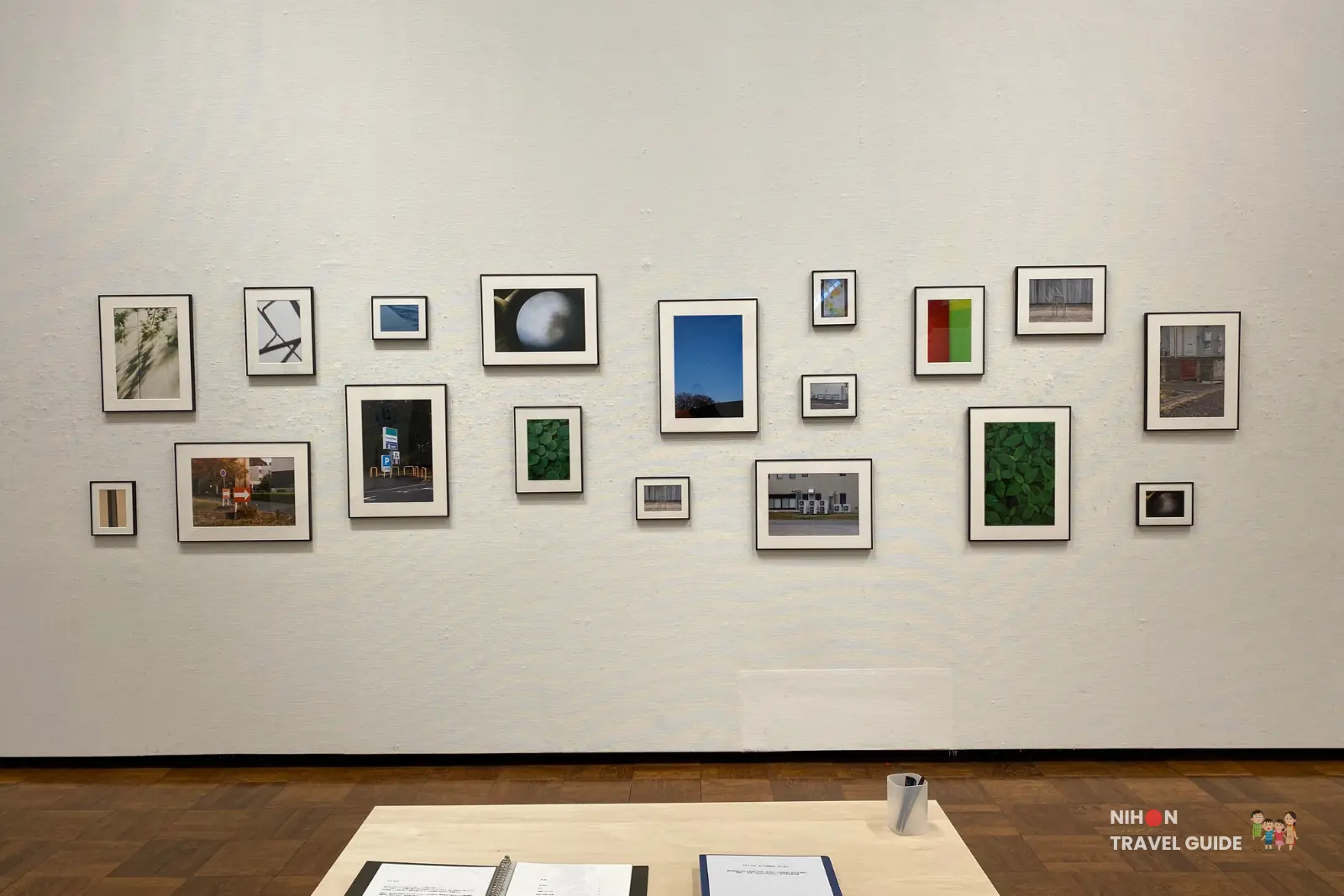 My room \ My story photography series by Sumire Mita — salon-style grid of framed everyday photographs on the gallery wall