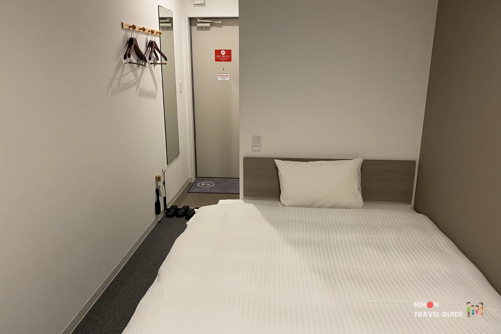 View of the comfortable single bed from the entrance in Room 23 at R9 The Yard Hotel Hitachinaka Ichige