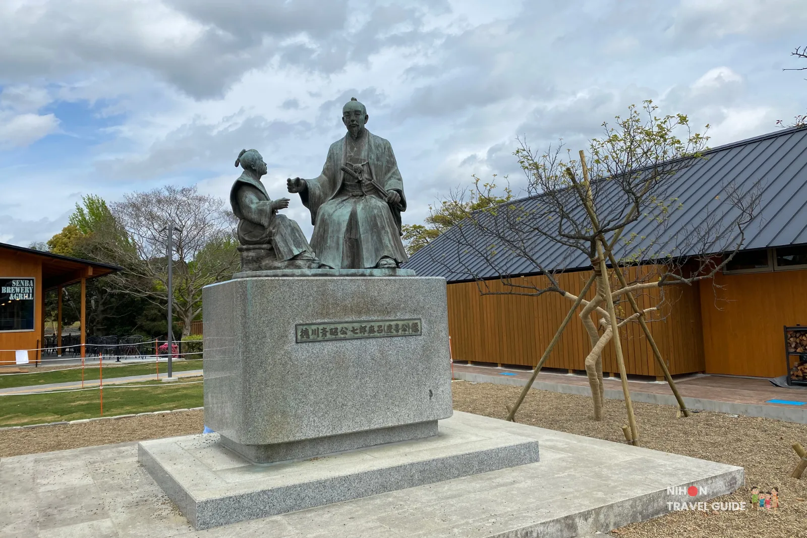 Bronze statue of Tokugawa Mitsukuni at Mito Kobun Terrace beside Lake Senba.