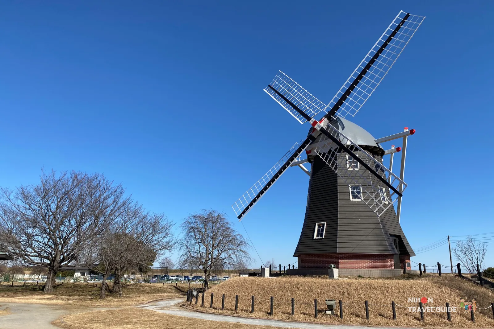 Dutch windmill on a clear blue winter day at Akebonoyama Agricultural Park in Chiba
