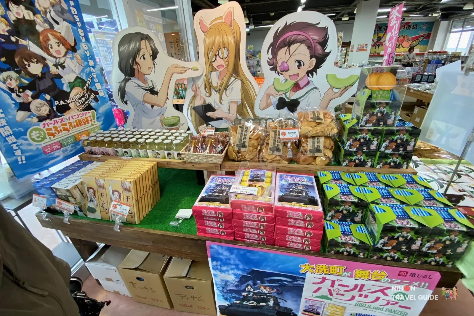 Girls und Panzer themed omiyage souvenirs and merchandise display at Oarai Maiwai Market inside Seaside Station.