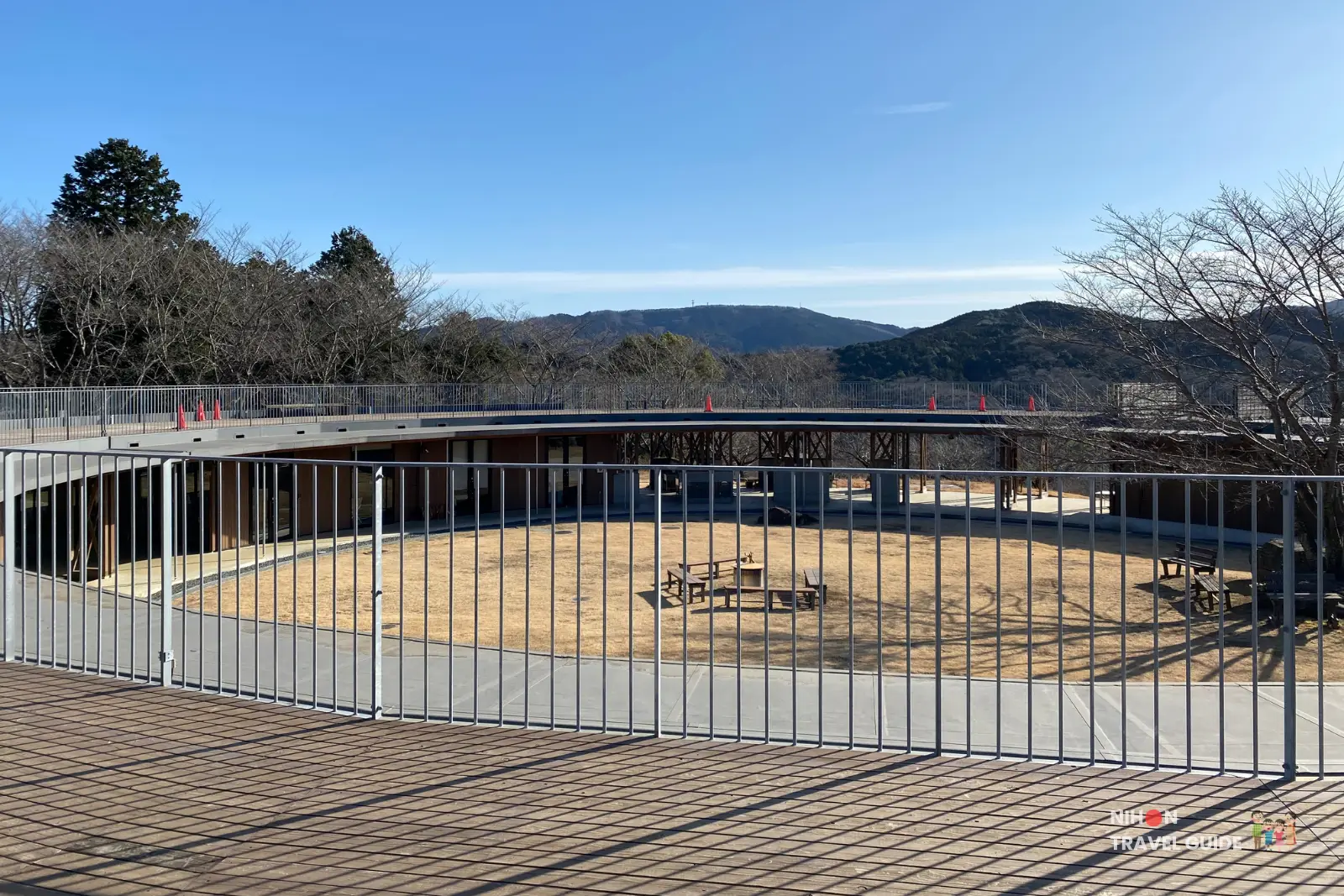Circle Lodge and observation deck at Hanayasatoyama camping area in Ibaraki Flower Park during winter.