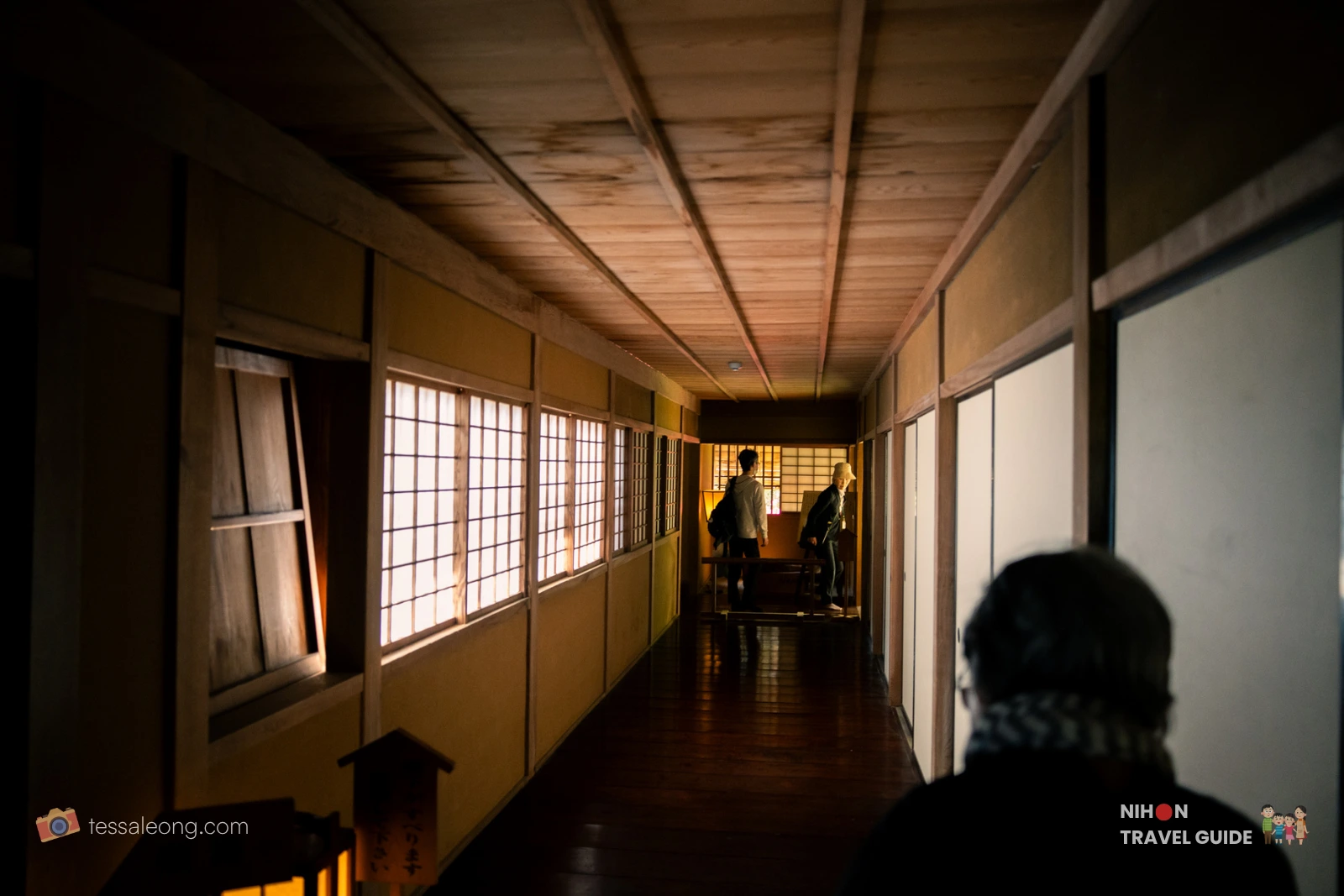 Long wooden corridor inside Kobuntei pavilion at Kairakuen Garden, showing the traditional architecture and visitor flow