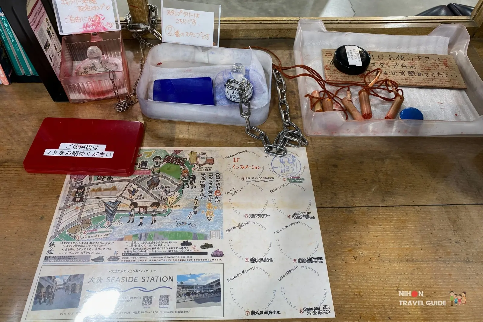 Stamp rally kit with map, ink pad, and chain at Oarai Garupan Gallery