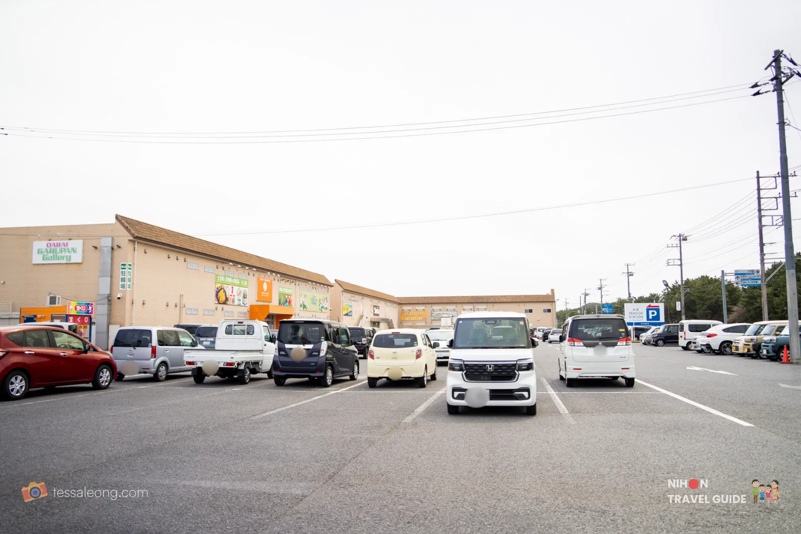 oarai-seaside-station-parking-lot-cars-ibaraki-japan Spacious parking lot at Oarai Seaside Station with plenty of car spaces in Ibaraki Prefecture Japan