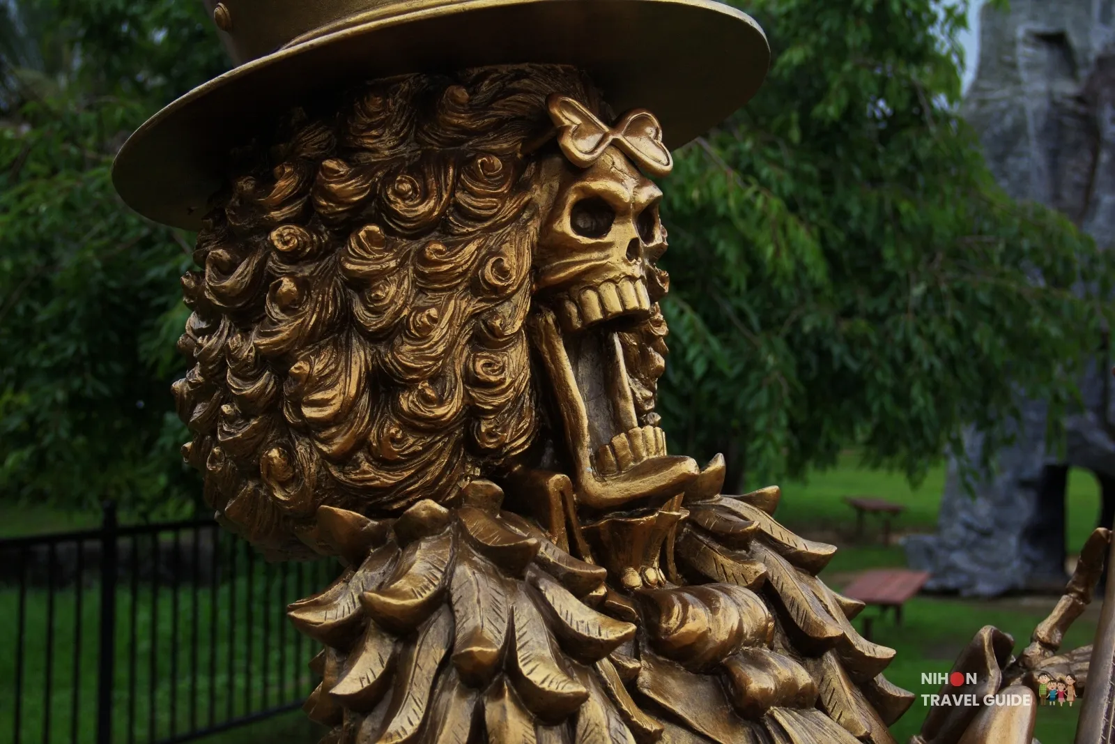 Detailed close-up of Brook’s skeleton face and afro from the One Piece bronze statue at Mifune Dinosaur Park in Kumamoto.