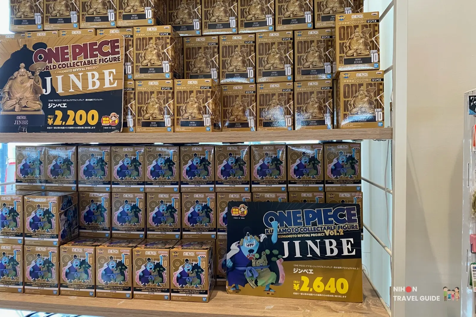 Shelves of limited edition Jinbe bronze and coloured figurines from the One Piece Kumamoto Revival Project for sale at OKAGESAMA MOBA
