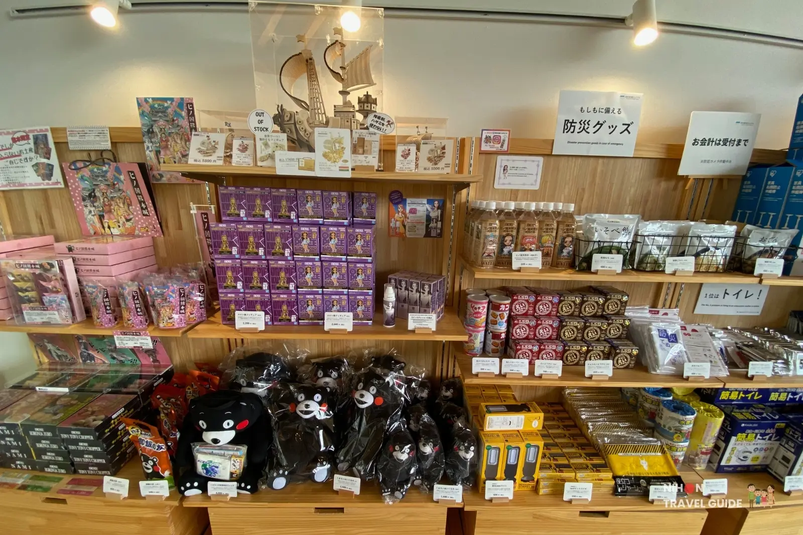 Interior of the gift shop at Kumamoto Earthquake Memorial Museum KIOKU selling Nico Robin One Piece figurines and local souvenirs.