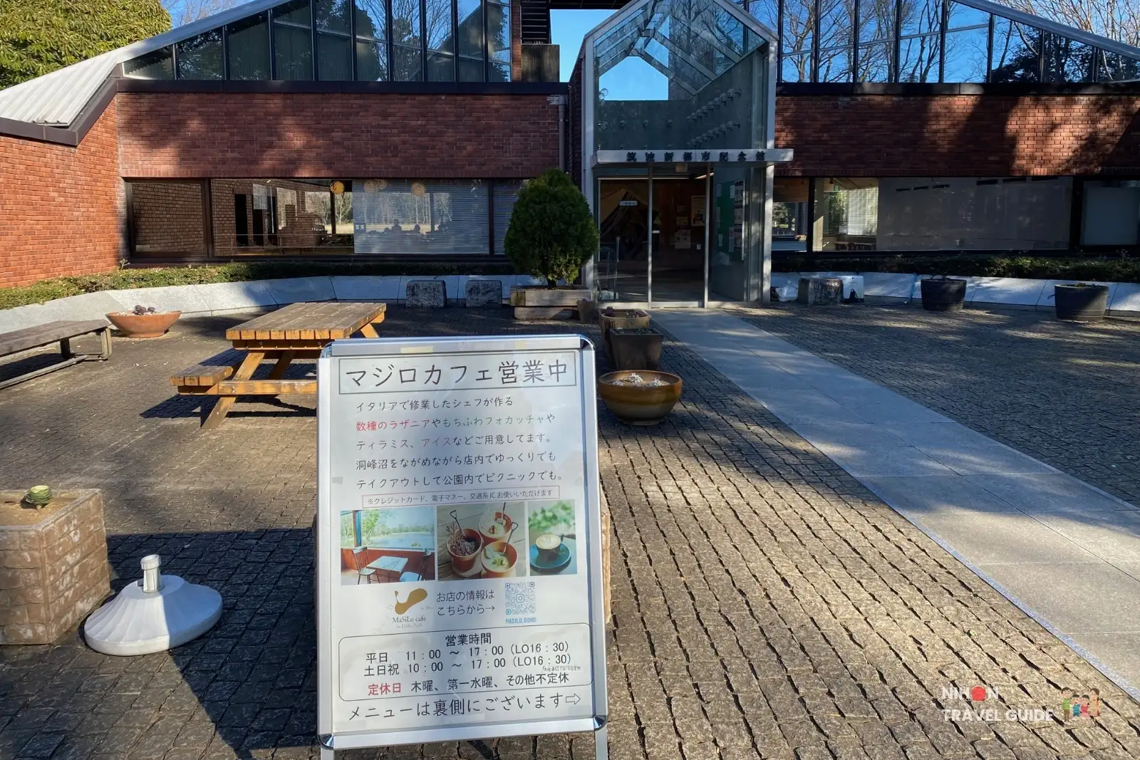 MaSiLo Cafe entrance and open sign at the New City Memorial Hall in Doho Park Tsukuba