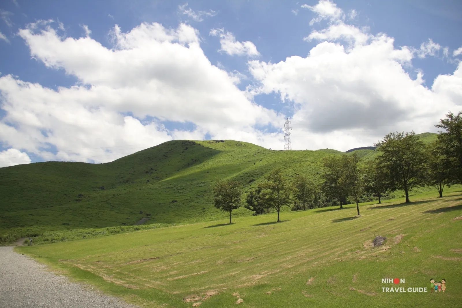 Scenic view of the rolling green hills and grassland near Moe no Sato in the Aso region of Kumamoto.