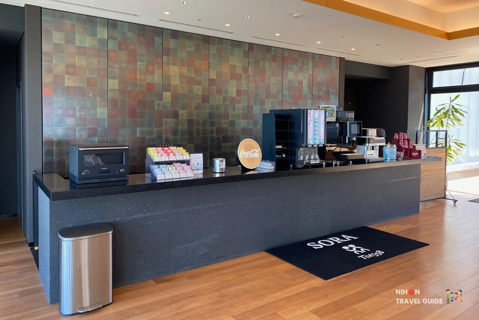 Complimentary drinks counter with Costa Coffee and soft drinks in the 11F lounge at The358 SORA Fukuoka